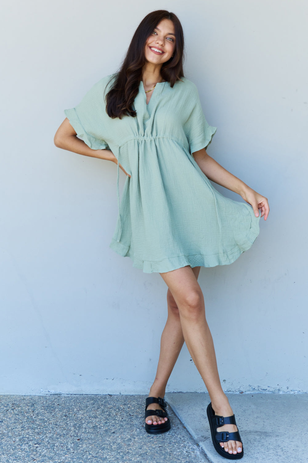 Light Sage Ruffle Hem Dress with Drawstring Waistband | The Exclusive Emerald