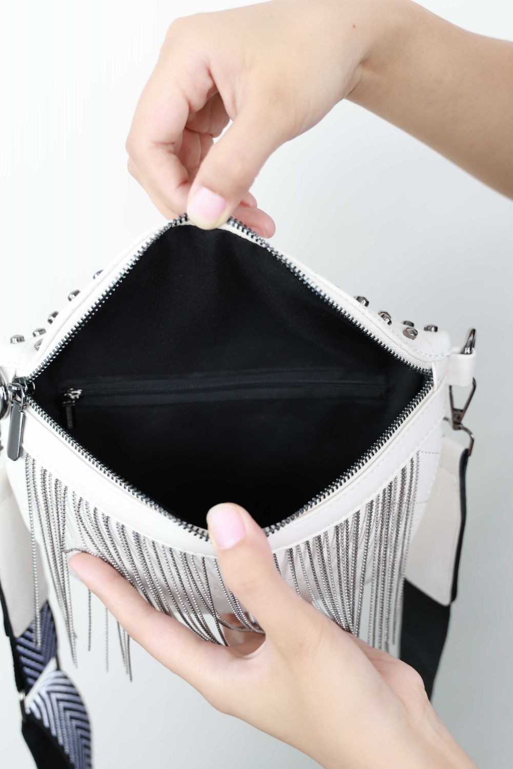 Edgy Leather Studded Sling Bag with Fringes | Must-Have Accessory