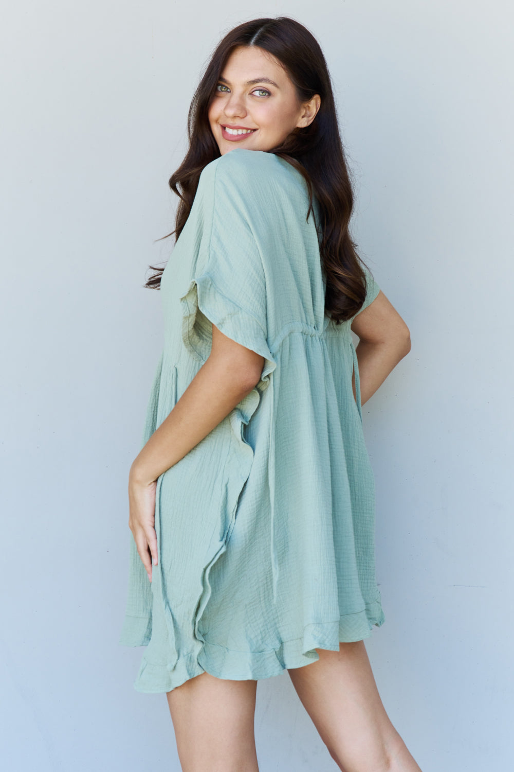 Light Sage Ruffle Hem Dress with Drawstring Waistband | The Exclusive Emerald