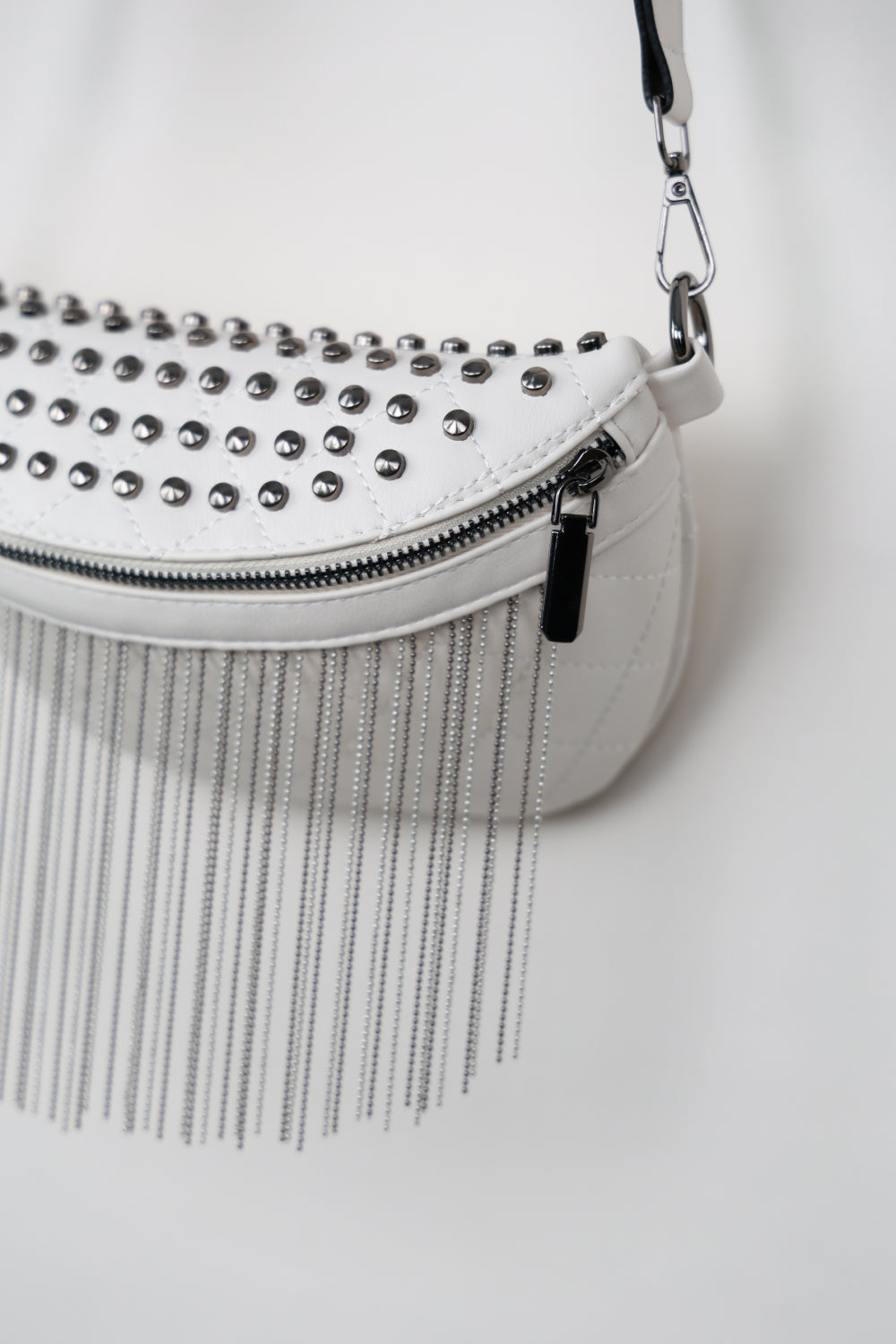 Edgy Leather Studded Sling Bag with Fringes | Must-Have Accessory