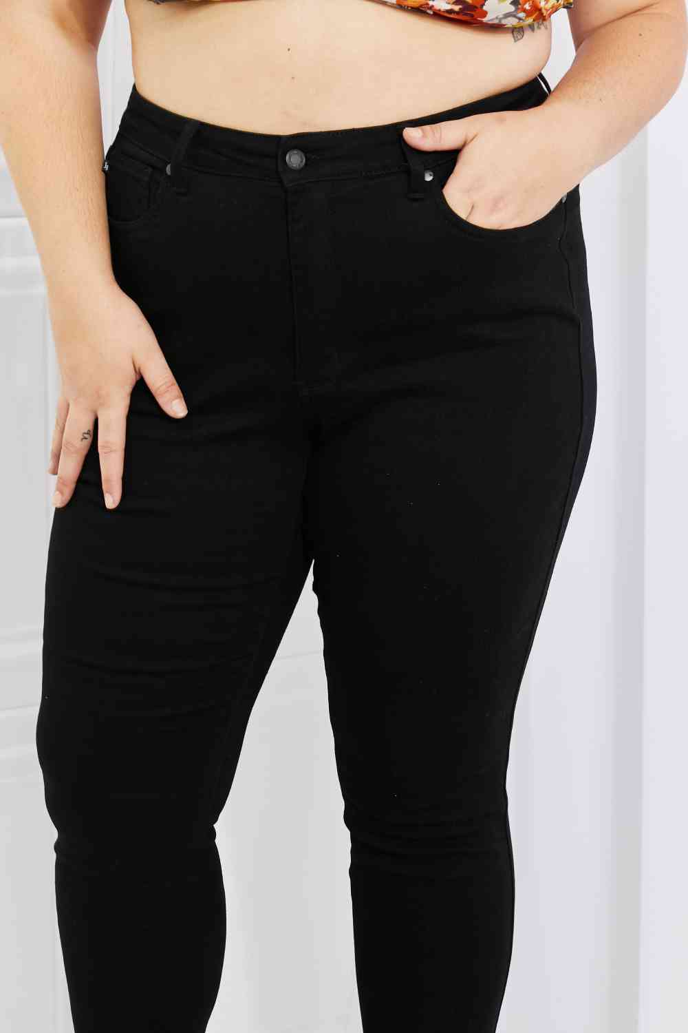 Front view of Plus Size Judy Blue Mila High Waisted Shark Bite Hem Skinny Jeans in black