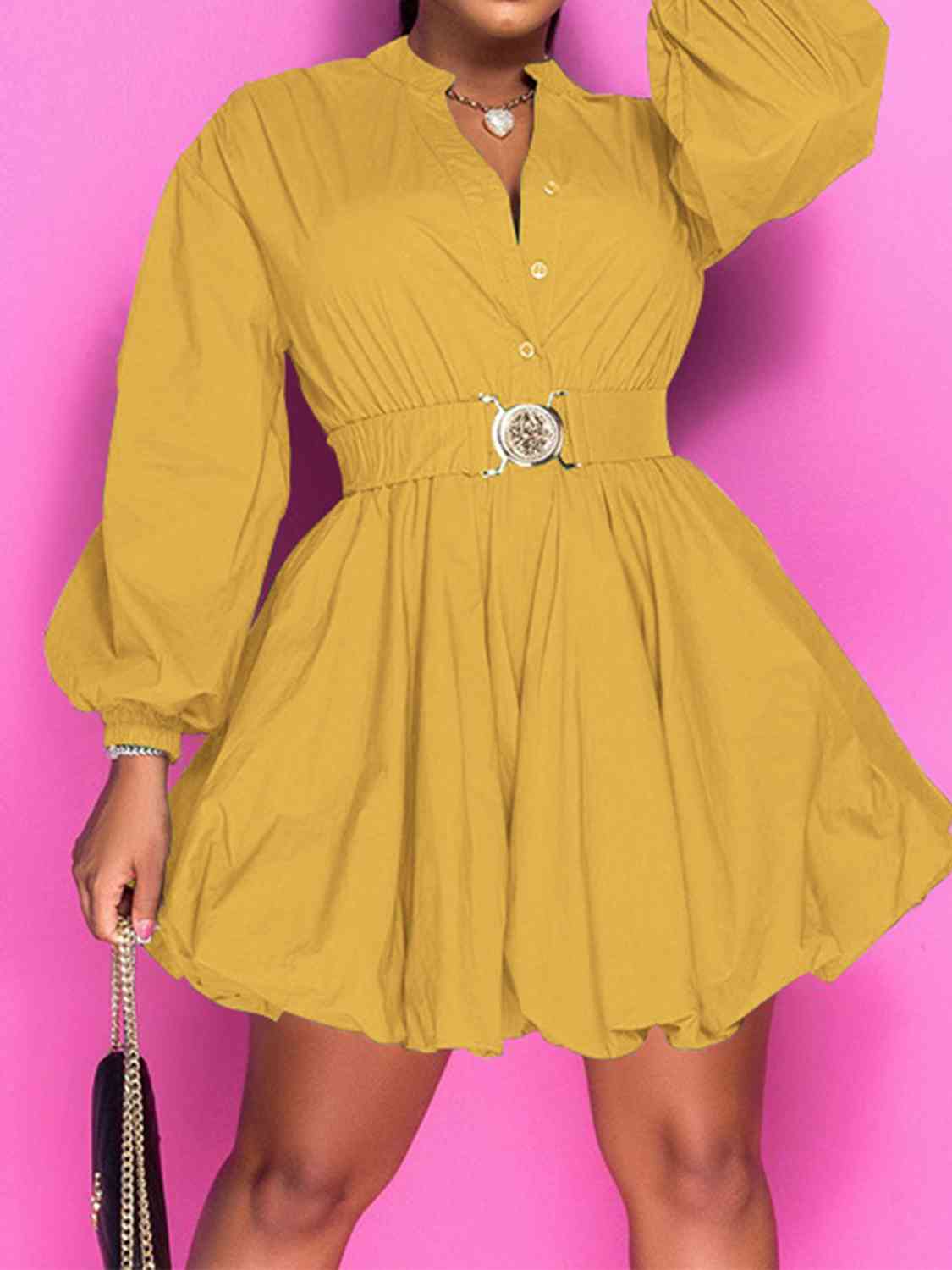 Front view of model wearing notched button up ballon sleeve dress in yellow 