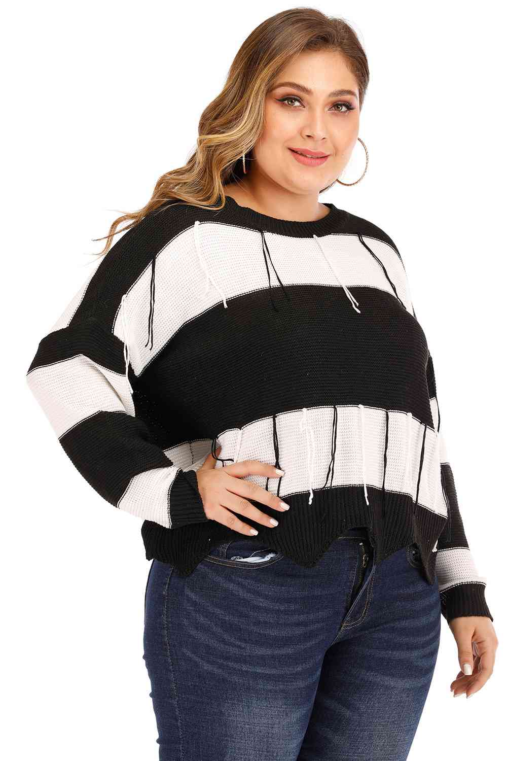 Model wearing Plus Size Drop Shoulder Color Block Sweater - Right side full body view